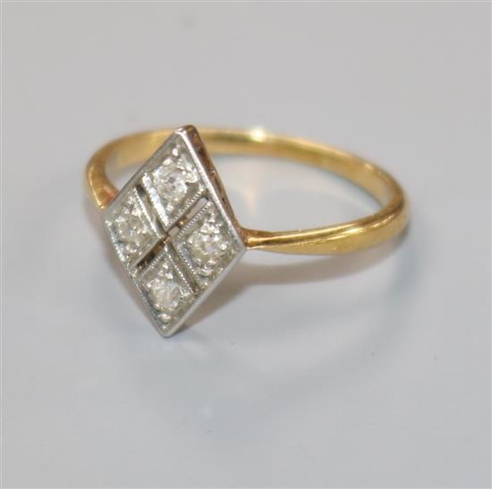 A 1920s/1930s 18ct gold, platinum and four stone diamond ring, size I.